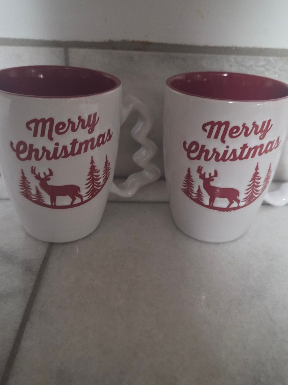 Festive White Ceramic Mugs with Red Interior and Reindeer Print, Set Of 2